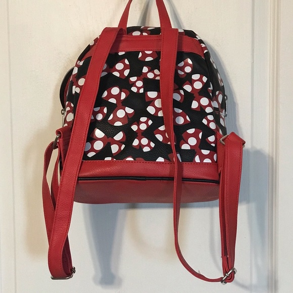 A beautiful Mini Disney Backpack with one packet outside. - Picture 2 of 9